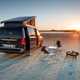 Image of a Mercedes Marco Polo pitched on a beach at sunset