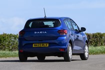 Dacia Sandero review: rear three quarter cornering, blue paint