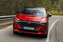 Nissan Qashqai (2025) review: front three quarter cornering, red paint