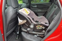 Nissan Qashqai with rear-facing Isofix child seat.
