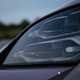 Porsche Taycan Cross Turismo review: LED headlight, close-up angle, purple paint