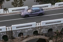 Porsche Taycan Cross Turismo review: side view static, wide angle shot, purple paint