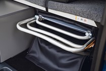 VW Caddy California campervan review - folding table and two chairs stowed in bag in boot