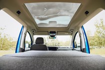 VW Caddy California campervan review - bed and panoramic roof