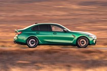 BMW M3 review: side view driving, green paint
