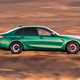 BMW M3 review: side view driving, green paint