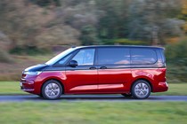 Volkswagen Multivan review, side view, driving, red and black, L2, Style eHybrid