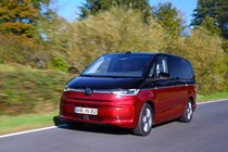 Volkswagen Multivan review, front side view, driving, red and black, L2, Style eHybrid