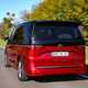 Volkswagen Multivan review, rear view, driving, red and black, L2, Style eHybrid