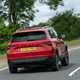 Skoda Karoq review, SE L, red, rear view, driving round corner