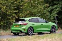 Ford Focus ST review, facelift, Mean Green, rear view, driving