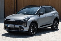 Kia Sportage review, silver, static, front three quarters (2025)