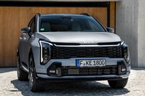 Kia Sportage review, silver, static, front three quarters (2025)