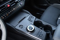 Kia Sportage review, black, interior, centre (2025)
