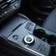 Kia Sportage review, black, interior, centre (2025)