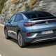 Volkswagen ID.5 electric SUV coupe review, rear view, driving
