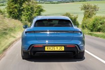 Porsche Taycan Sport Turismo (2025) review: rear driving, blue paint