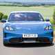 Porsche Taycan Sport Turismo (2025) review: front driving, blue paint