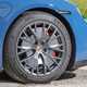 Porsche Taycan Sport Turismo (2025) review: alloy wheel detail, blue paint