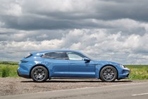 Porsche Taycan Sport Turismo (2025) review: side view static, blue paint