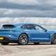 Porsche Taycan Sport Turismo (2025) review: rear three quarter static, blue paint