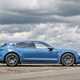 Porsche Taycan Sport Turismo (2025) review: side view static, blue paint