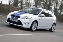 Image of a white 2008 Ford Focus ST, viewed from the front left corner while driving