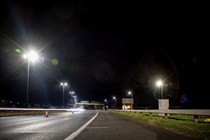 Image showing a closed motorway at night, taken from a position standing on the hard shoulder