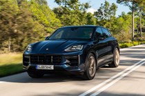 Porsche Cayenne Coupe review - 2023 facelift - Turbo E-Hybrid with GT Package, front, blue and gold, driving on road