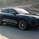 Porsche Cayenne Coupe review - 2023 facelift - Turbo E-Hybrid with GT Package, front, blue and gold, driving round corner on racing circuit