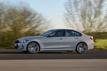 BMW 3 Series review - 2022 facelift, grey, side view, driving
