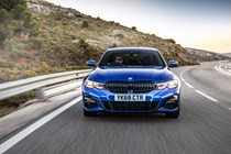 BMW 3 Series review - dead-on front view, blue, driving