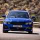 BMW 3 Series review - dead-on front view, blue, driving round corner