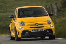 Abarth 595 (2022) review: front three quarter cornering, yellow car