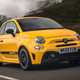 Abarth 595 (2022) review: front three quarter driving, wooded lane