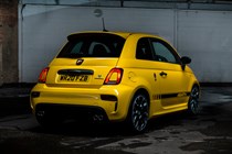 Abarth 595 (2022) review: rear three quarter static, yellow car