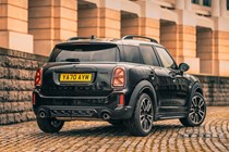 MINI Countryman (2023) review: rear three quarter static, black paint, building in background