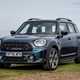 MINI Countryman (2023) review: front three quarter static, blue paint, sea in background