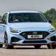 Hyundai i30 (2022) review - i30 N front cornering shot, blue car