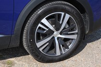 Peugeot 3008 SUV (2016-) UK GT-Line model in blue - exterior detail - Rear wheel, tyres and brake calipers