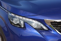 Peugeot 3008 SUV (2016-) UK GT-Line model in blue - exterior detail - Front headlamp cluster