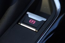 Peugeot 3008 SUV (2016-) UK rhd GT-Line. Interior detail - Electronic parking brake button on/off