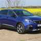 Peugeot 3008 SUV (2016-) UK rhd GT-Line in blue. Static exterior front three-quarters