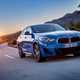 BMW 2018 X2 (lhd) in blue front three-quarters driving/action