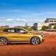 BMW 2018 X2 (lhd) in yellow/gold - driving/action
