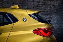 BMW 2018 X2 in yellow/gold exterior detail - rear boot spoiler