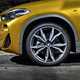 BMW 2018 X2 in yellow/gold exterior detail - front wheel