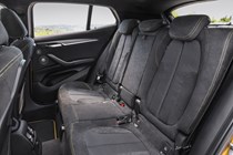 BMW 2018 X2 in yellow/gold - interior detail rear passenger seats
