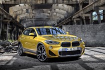 BMW 2018 X2 in yellow/gold - static exterior - front three-quarters