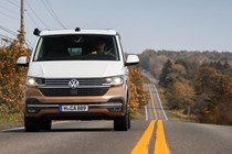 VW California review - 2019 T6.1 model, dead-on front view, driving, two-tone paint